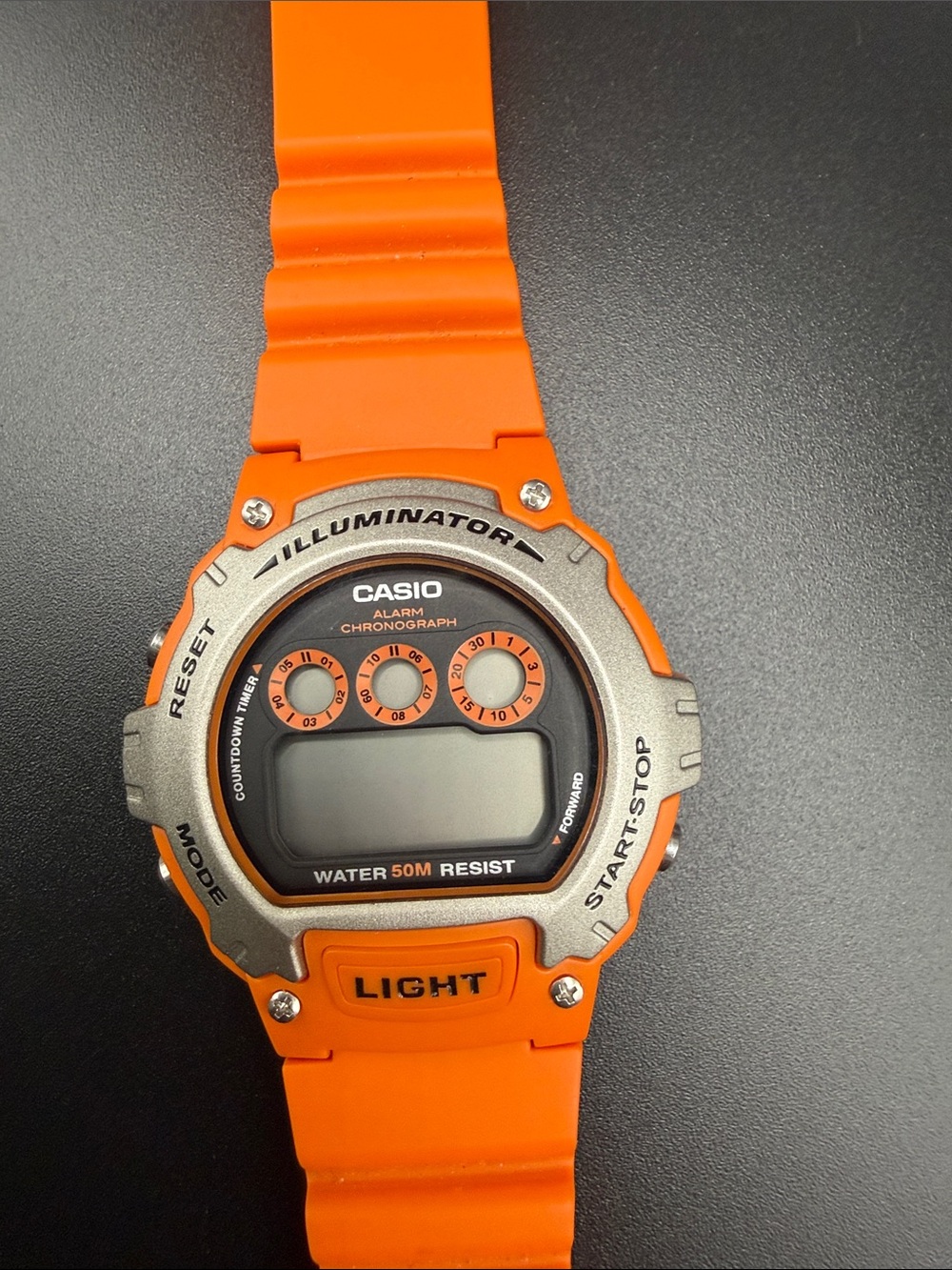 Casio Orange Digital Illuminator Watch with Silver Bezel